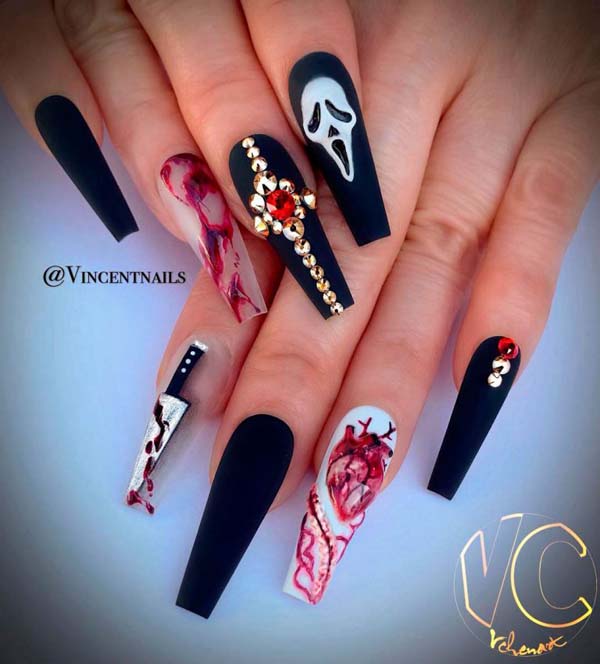 Cool Halloween Nails With Studded Skulks And Cross #nails #Halloween nails #trendypins