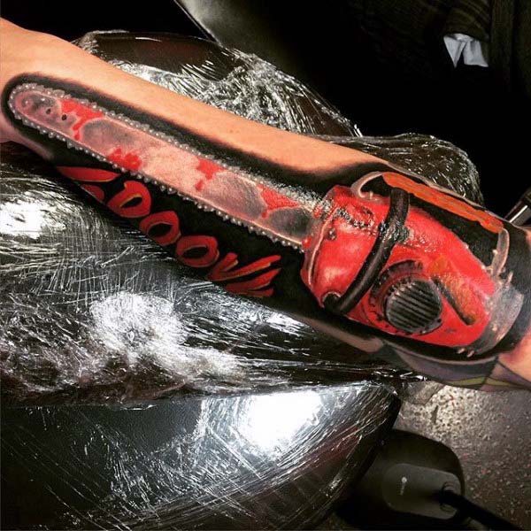 Chainsaw Tattoo Composed of Reds and Blacks #Halloween #tattoos #trendypins