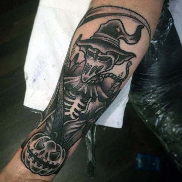 Detailed Monochrome Tattoo Featuring a Scarecrow and Jack O'lantern #Halloween #tattoos #trendypins