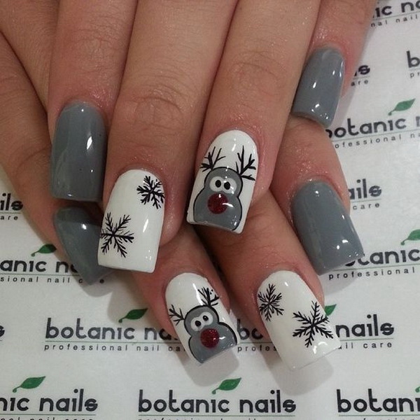 Grey and White Themed Christmas Nails with a Reindeer and Black Snowflakes #Christmas #nails #trendypins