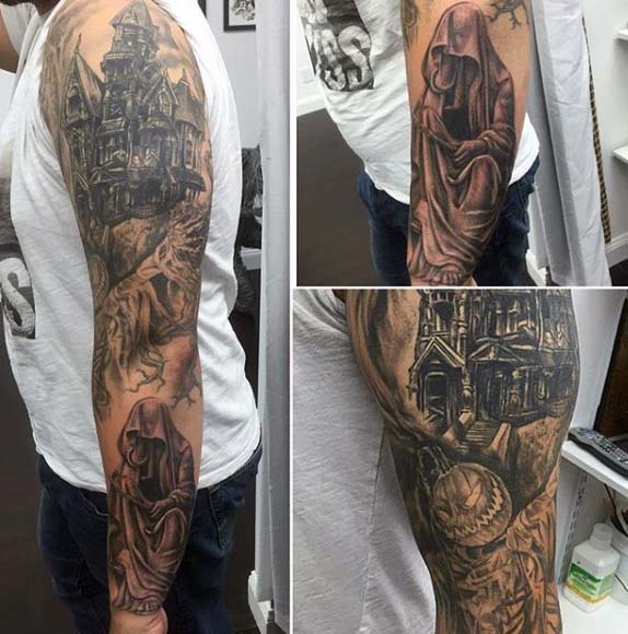 Large Sleeve Tattoo Featuring a Haunted House #Halloween #tattoos #trendypins