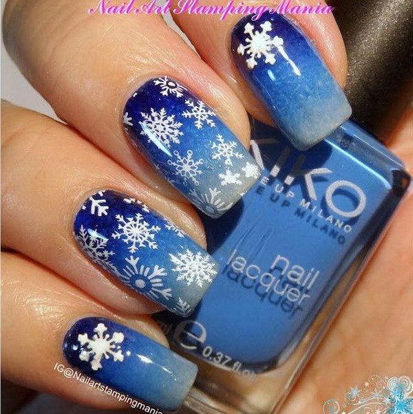 White Snowflakes on Blue Base Manicure #Christmas #nails #trendypins