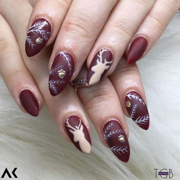 White Deer and Acorns on Dark Red Base Christmas Nails #Christmas #nails #trendypins