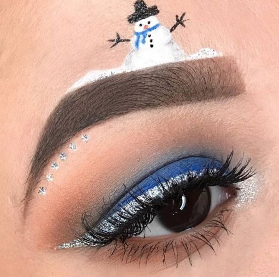 Snowman on an Eyebrow and Silver Eyeliner #Christmas #makeup #beauty #trendypins