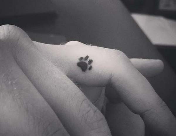 Dainty Dog Paw Finger Tattoo #tattoofinger #trendypins