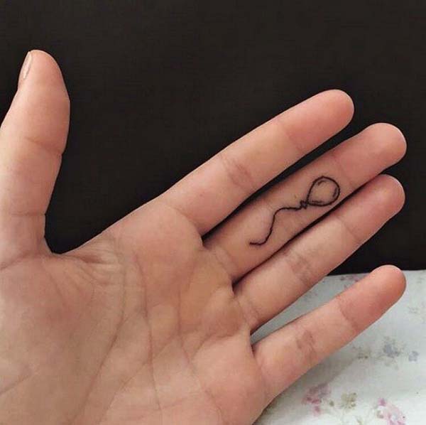 Minimal Line-drawn Balloon Tattoo on Finger #tattoofinger #trendypins