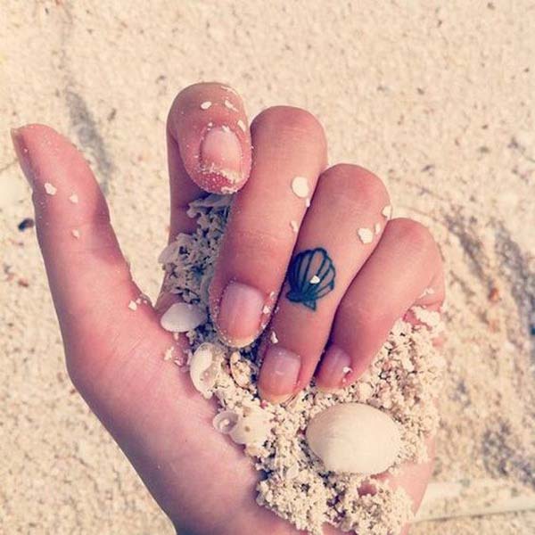 Seashell Tattoo Design on Finger #tattoofinger #trendypins