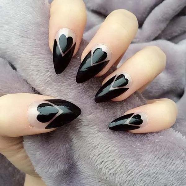 9. Black Hearts Negative Space Stiletto Nails #blacknails #beauty #trendypins