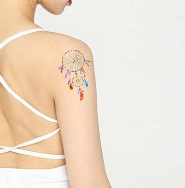 Colorful festival dreamcatcher tattoo