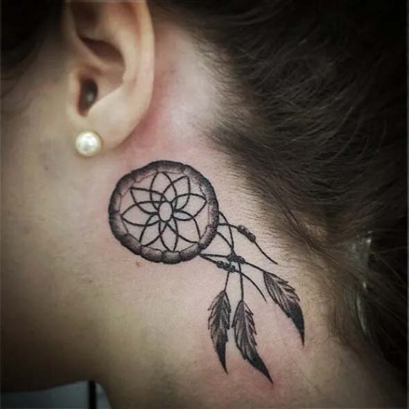 cute dreamcatcher tattoo behind ear