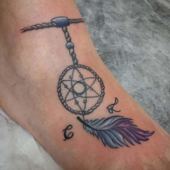 small dreamcatcher tattoo on ankle