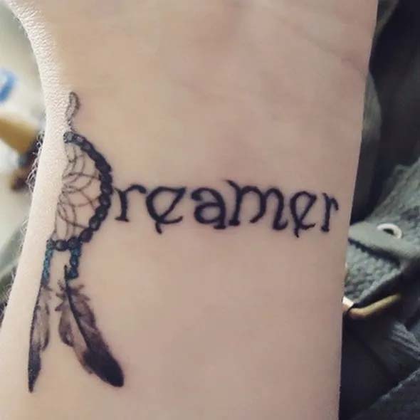 small dreamcatcher tattoo on wrist