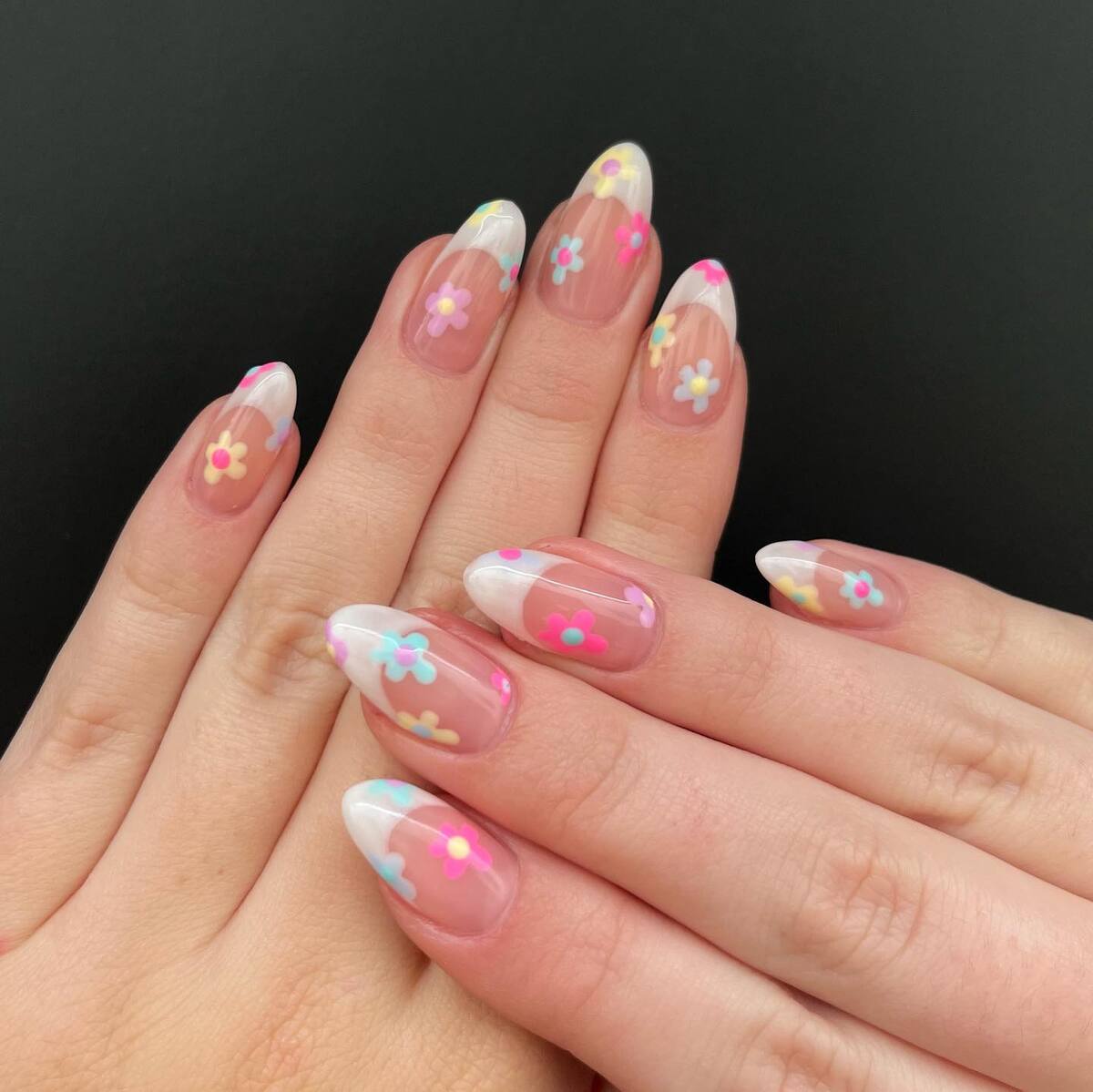 1. Playful Pastel Blooms on Sheer Nude