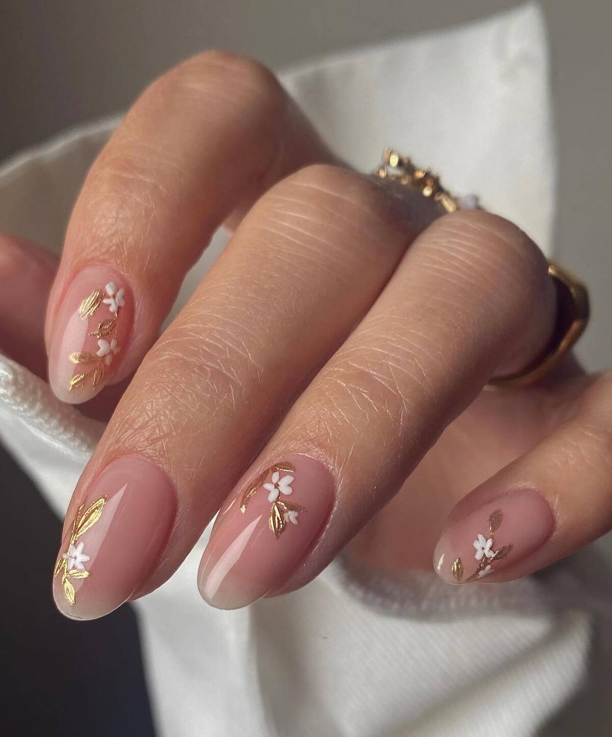 2. Luxe White Florals with Golden Leaves