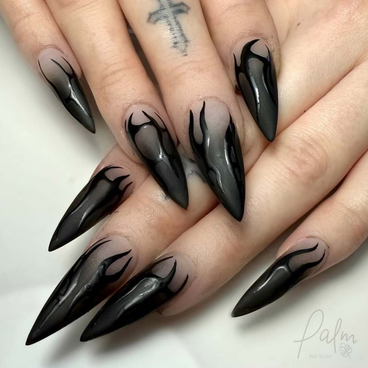 13. Smoky Black Flame Stiletto Nails
