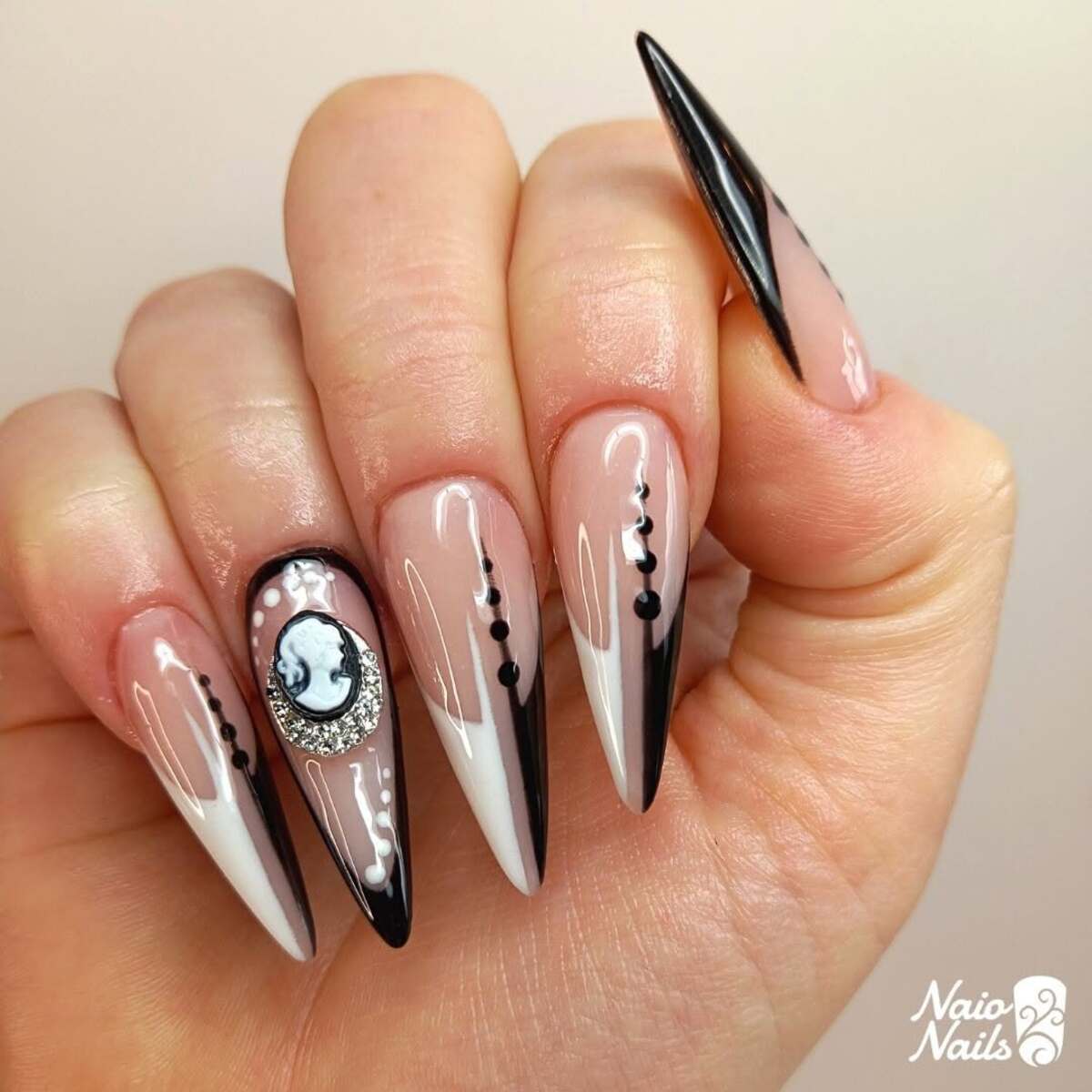 20. Gothic Cameo Black-and-White Nails