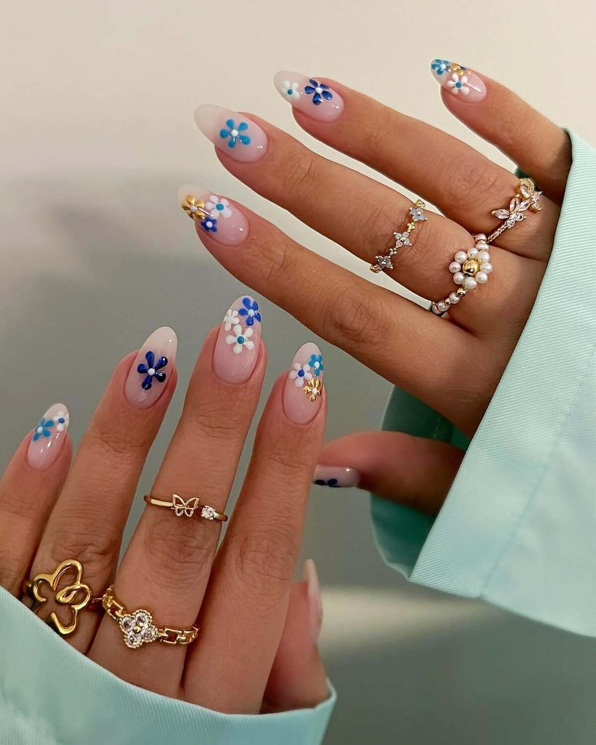 11. Chic Floral Acrylics with a Touch of Elegance