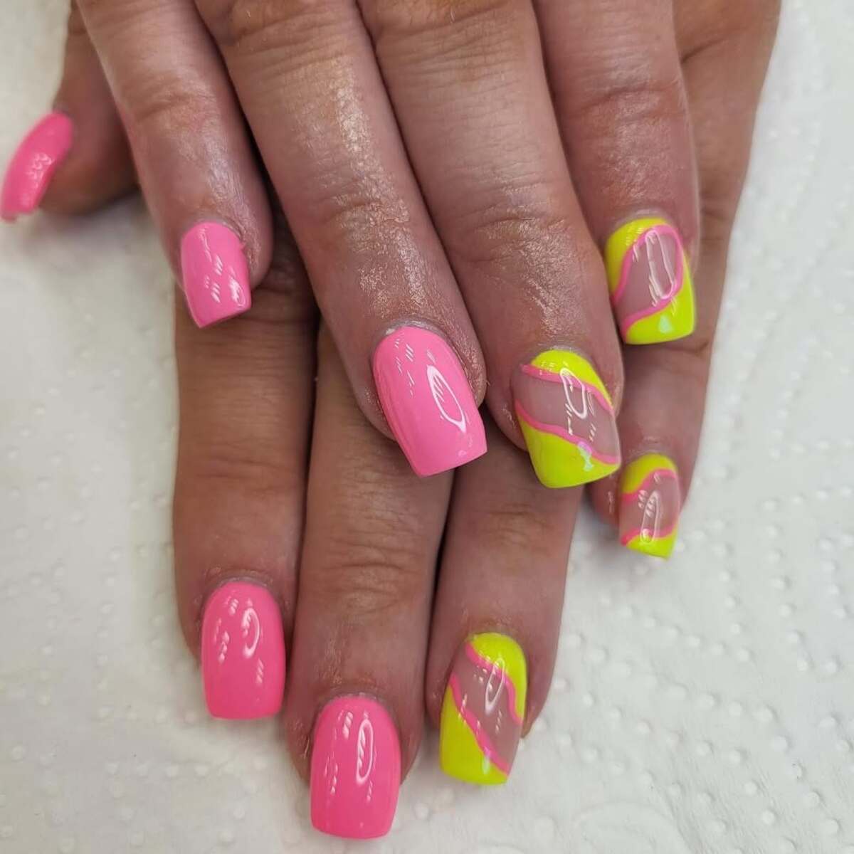 18. Vibrant Neon Pink and Yellow Acrylic Nails