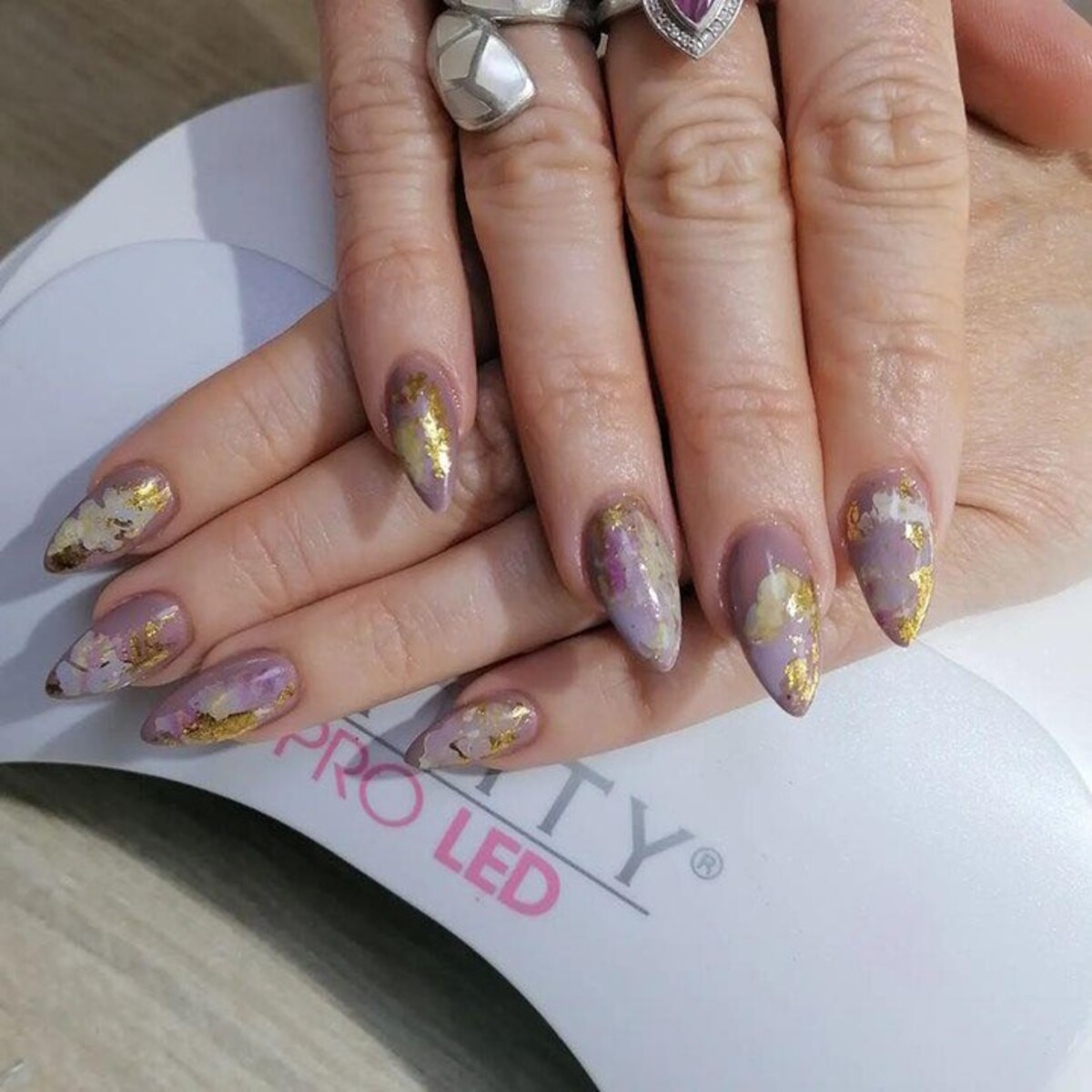 13. Earthy Mauve with Gilded Elegance