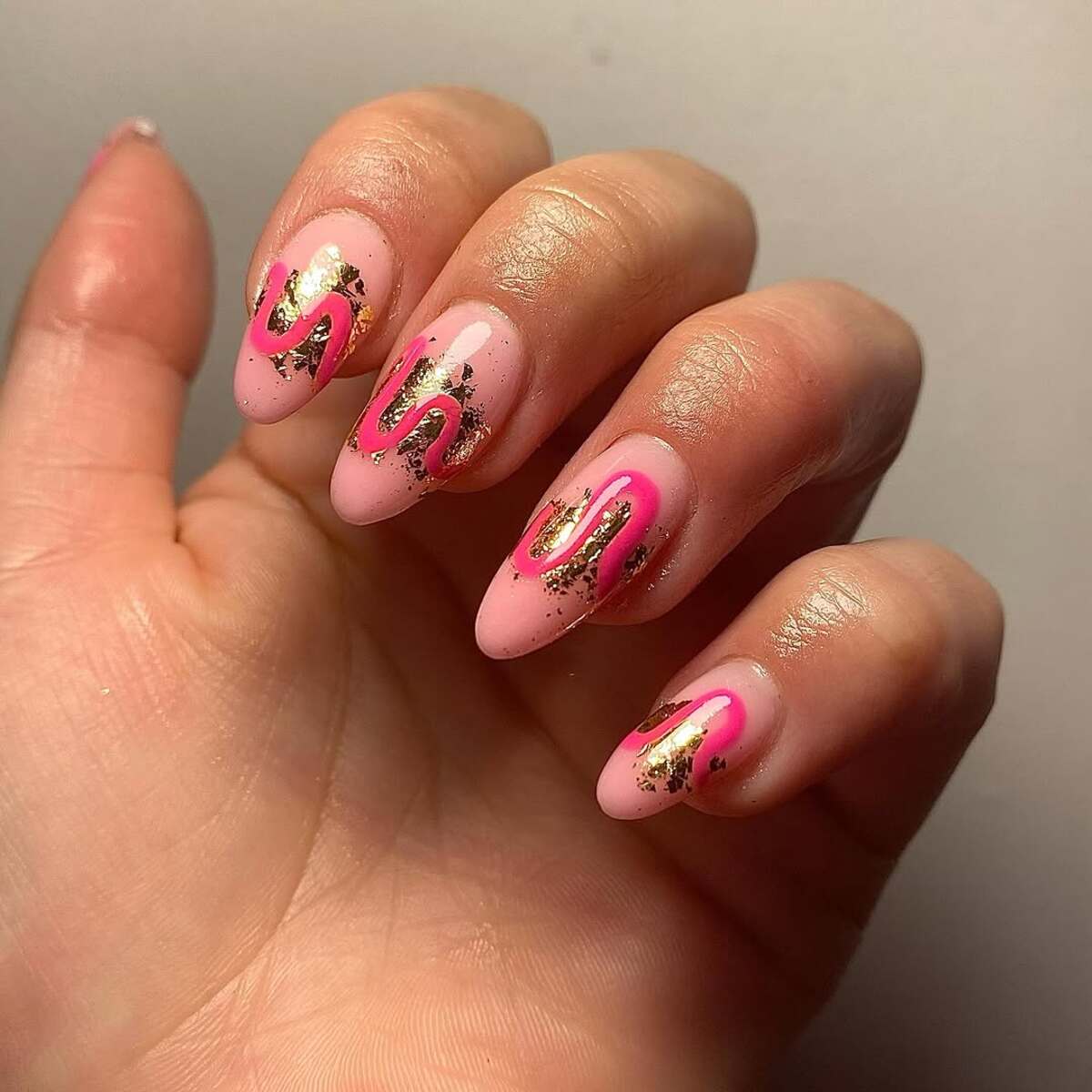 20. Fiery Elegance: Burnt Orange Nails with Gold Foil and Glitte