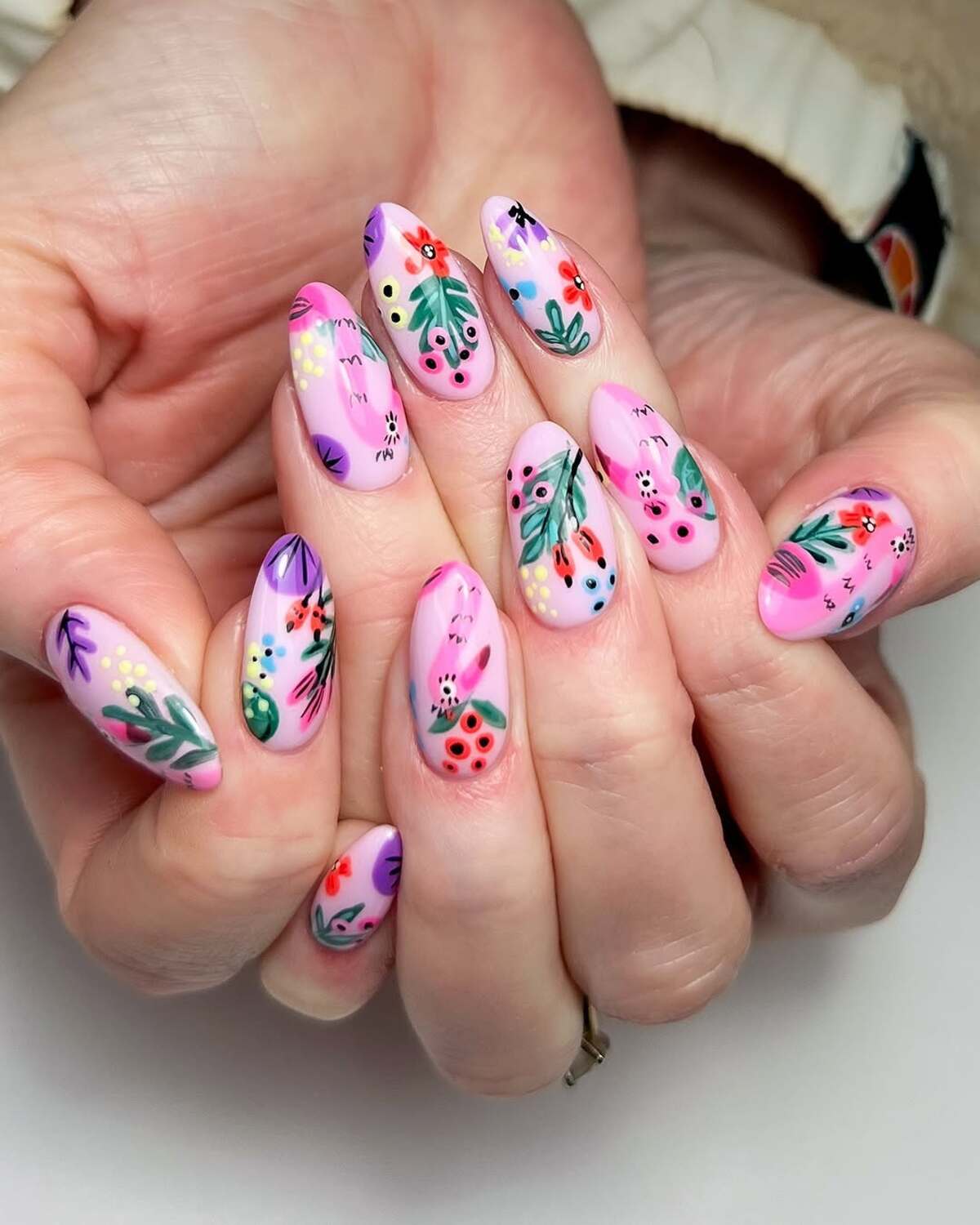 10. Playful Tropical Botanicals on a Pink Base