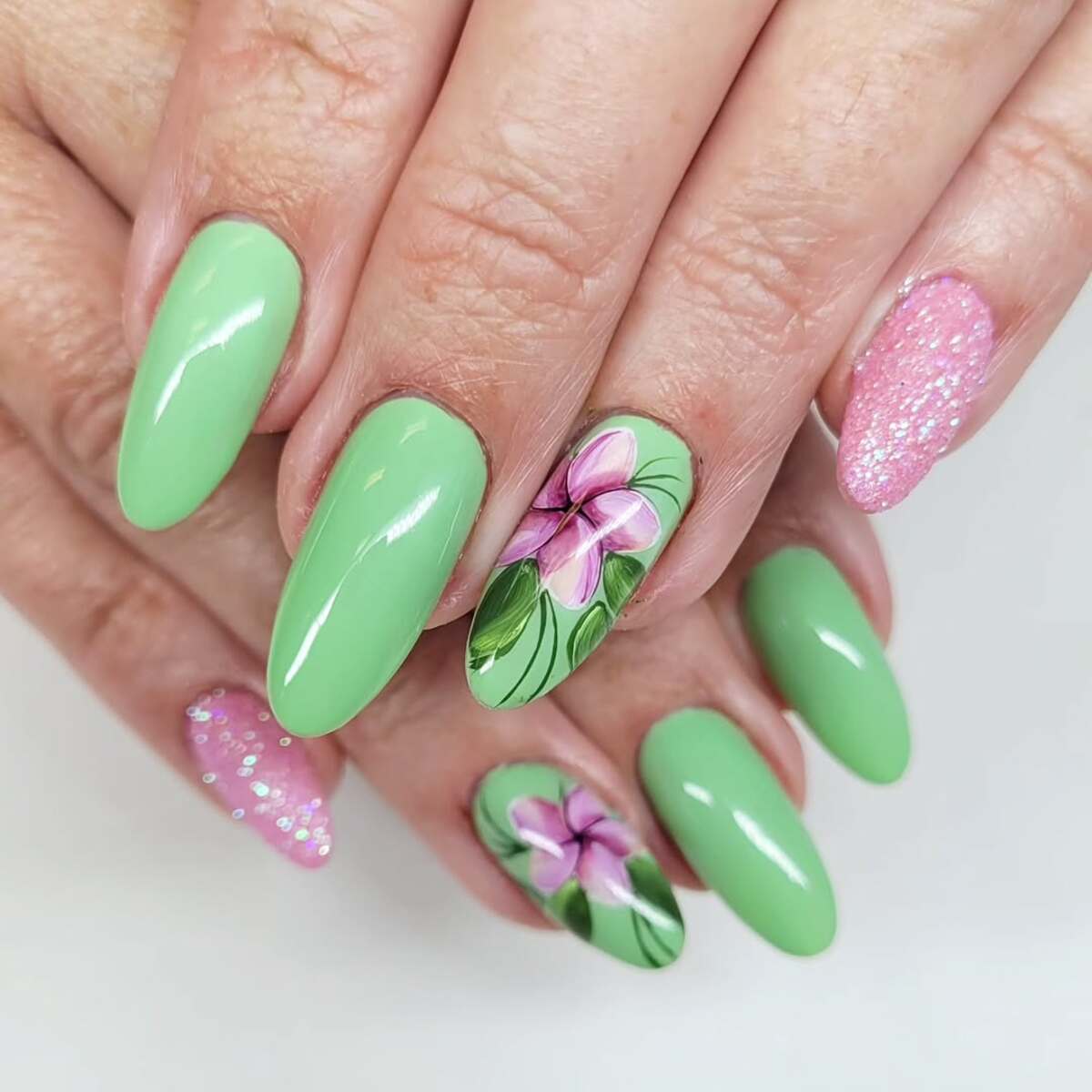18. Mint Green Elegance with Floral Accents
