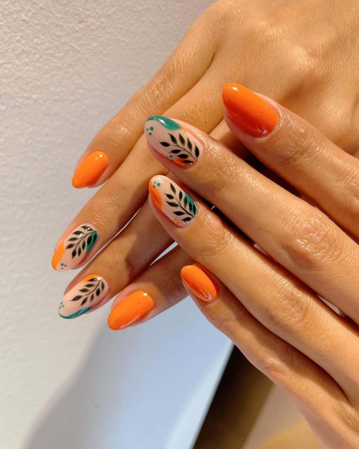 2. Sunset Orange with Botanical Accents