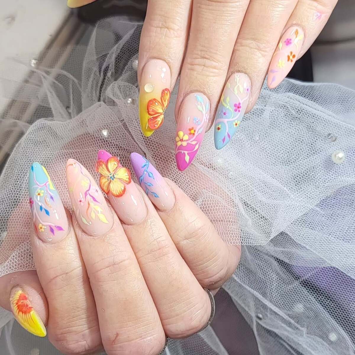 24. Pastel Paradise with 3D Floral Accents