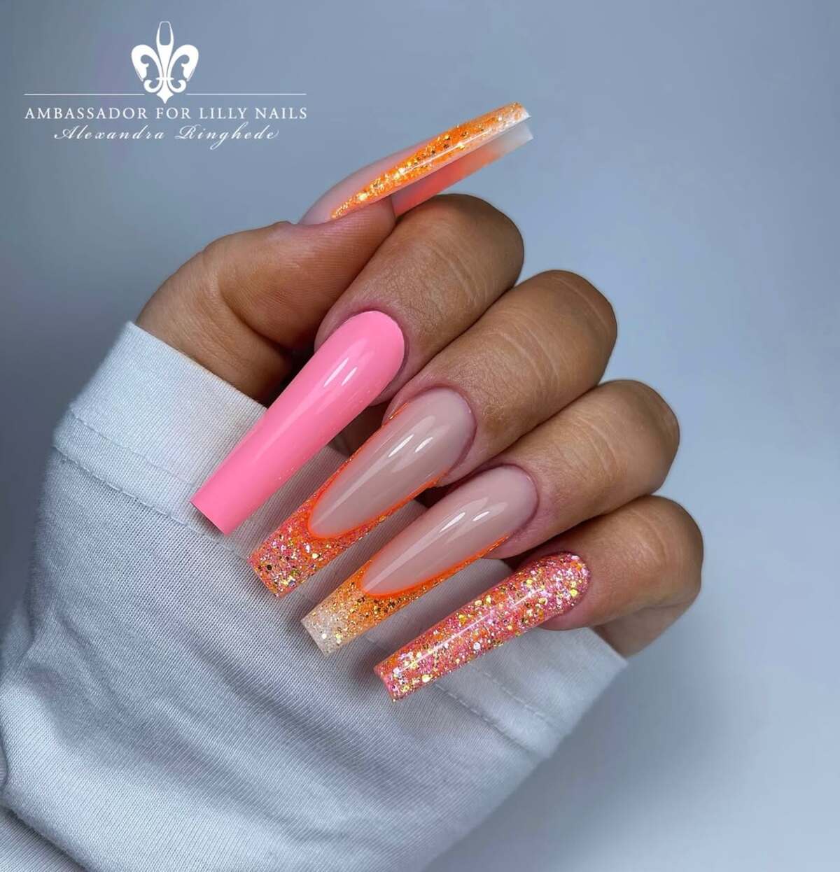 16. Ultra-Long Coffin Nails with Glitter Glam