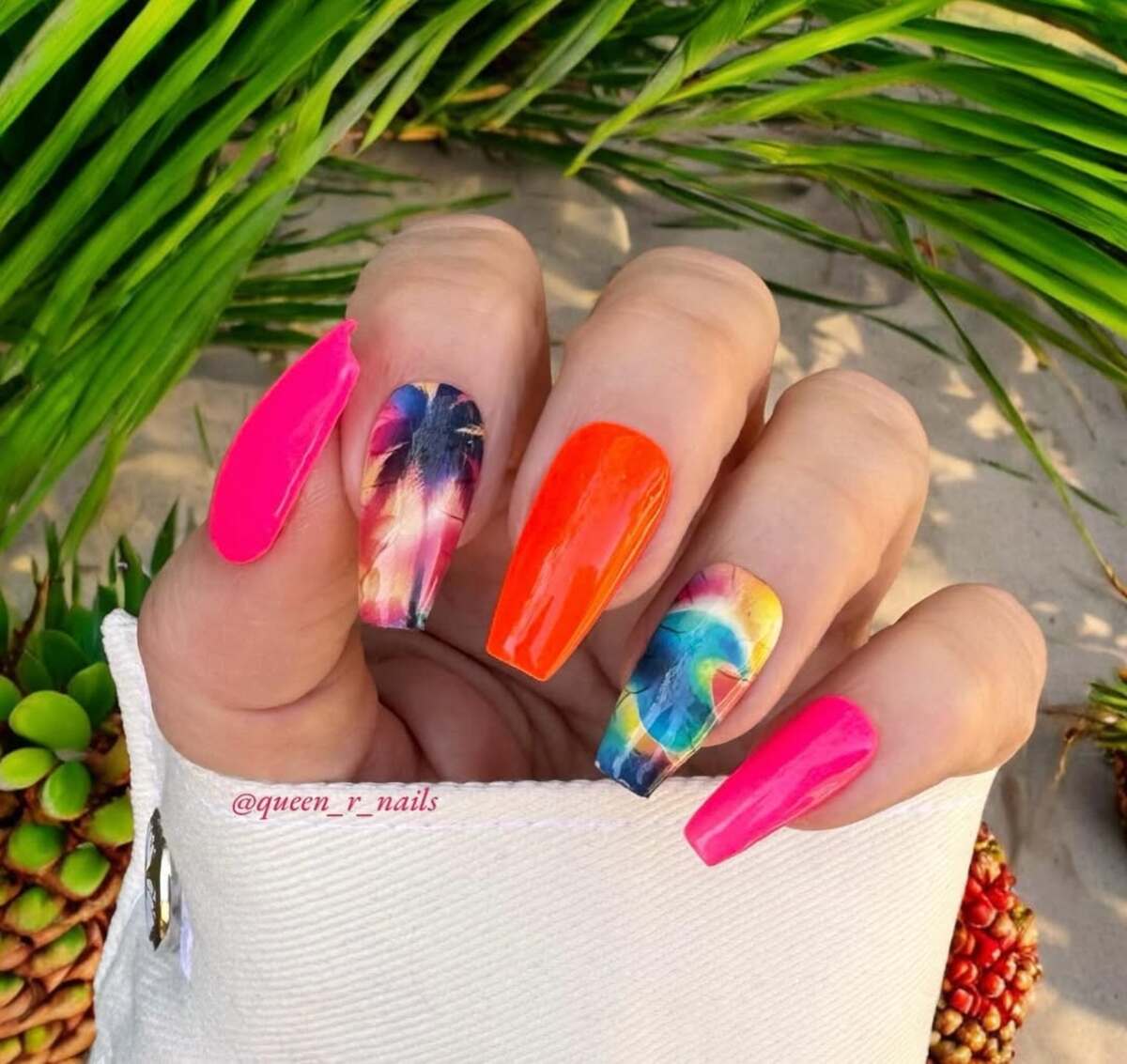 1. Tropical Sunset Nails with Neon Accents