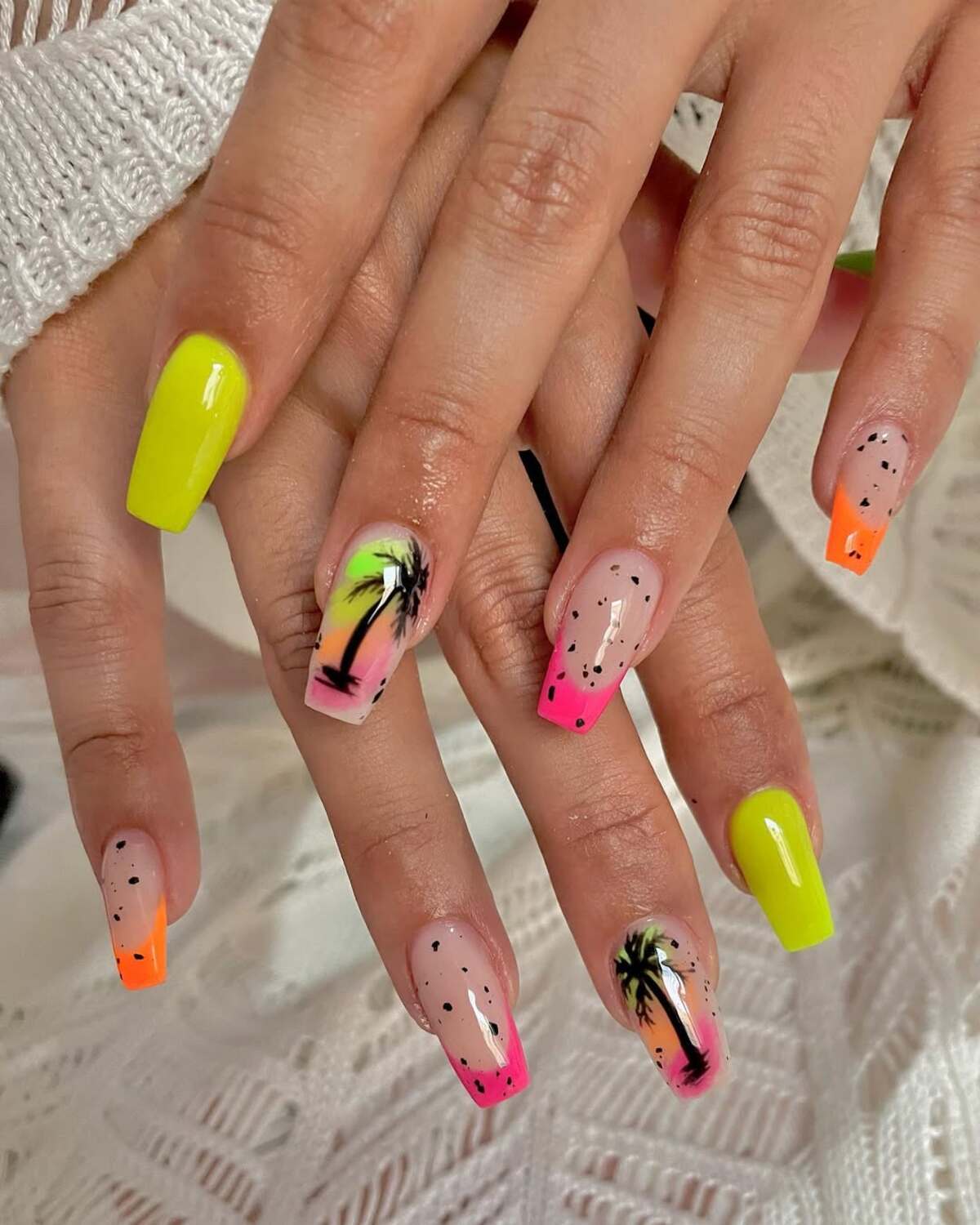10. Sunset-Inspired Neon Ombre Nails