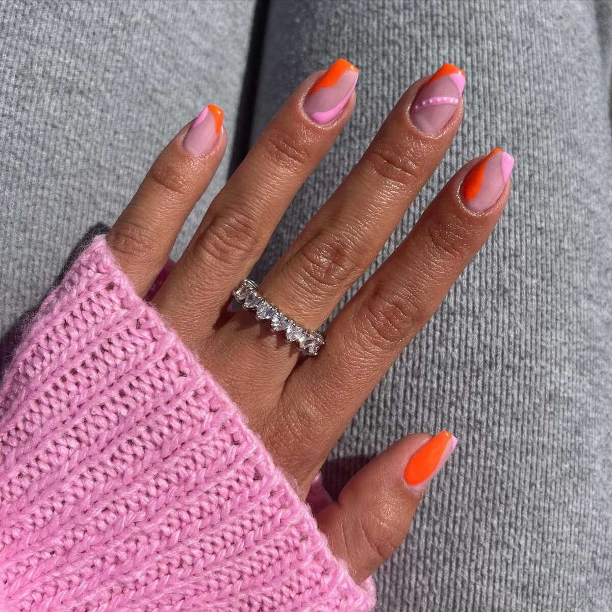 15. Soft Pink and Orange with Geometric Accents