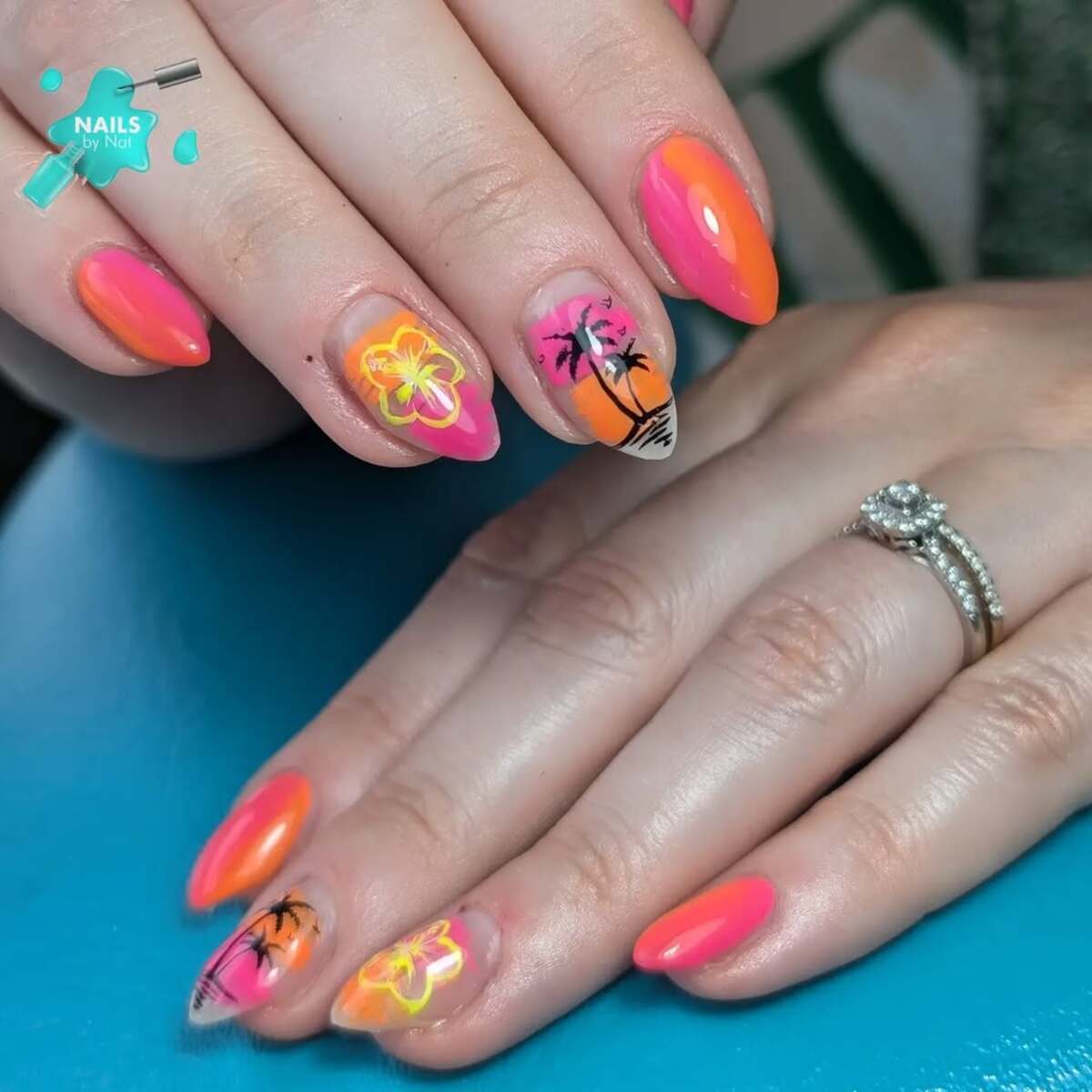 3. Sunset Gradient with Palm Tree and Floral Accents