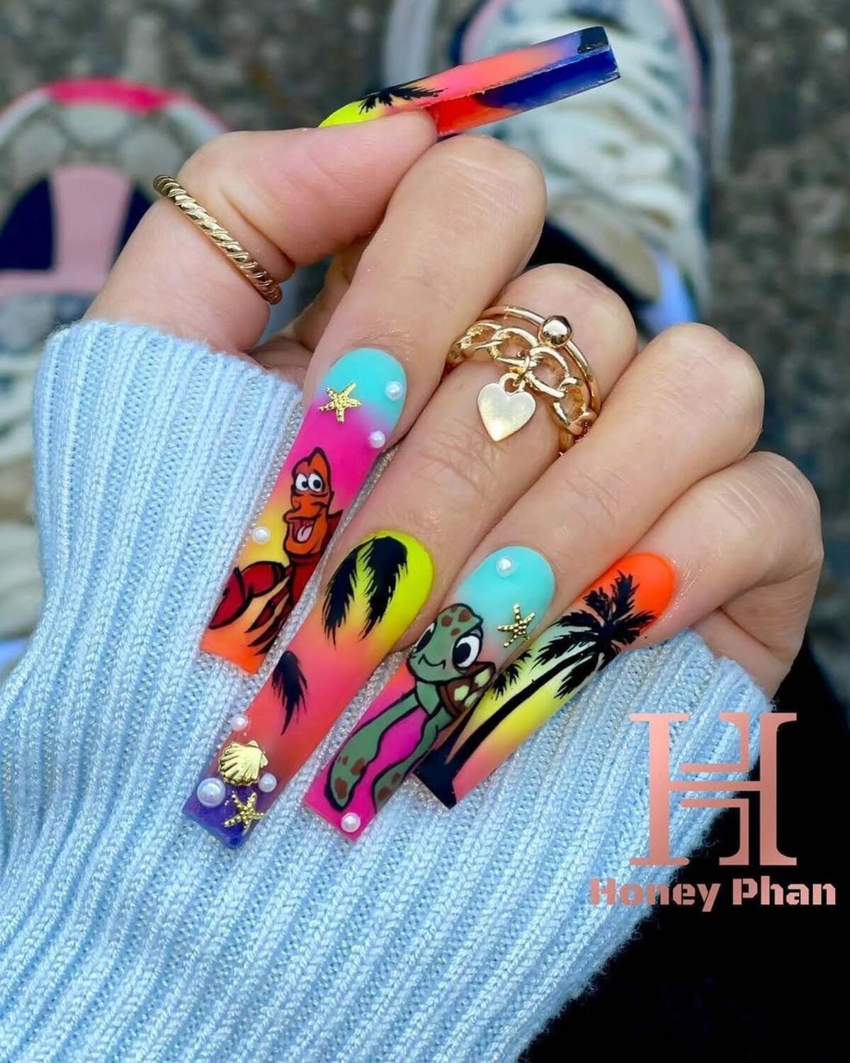 4. Beachy Cartoon Nails with Ocean Vibes