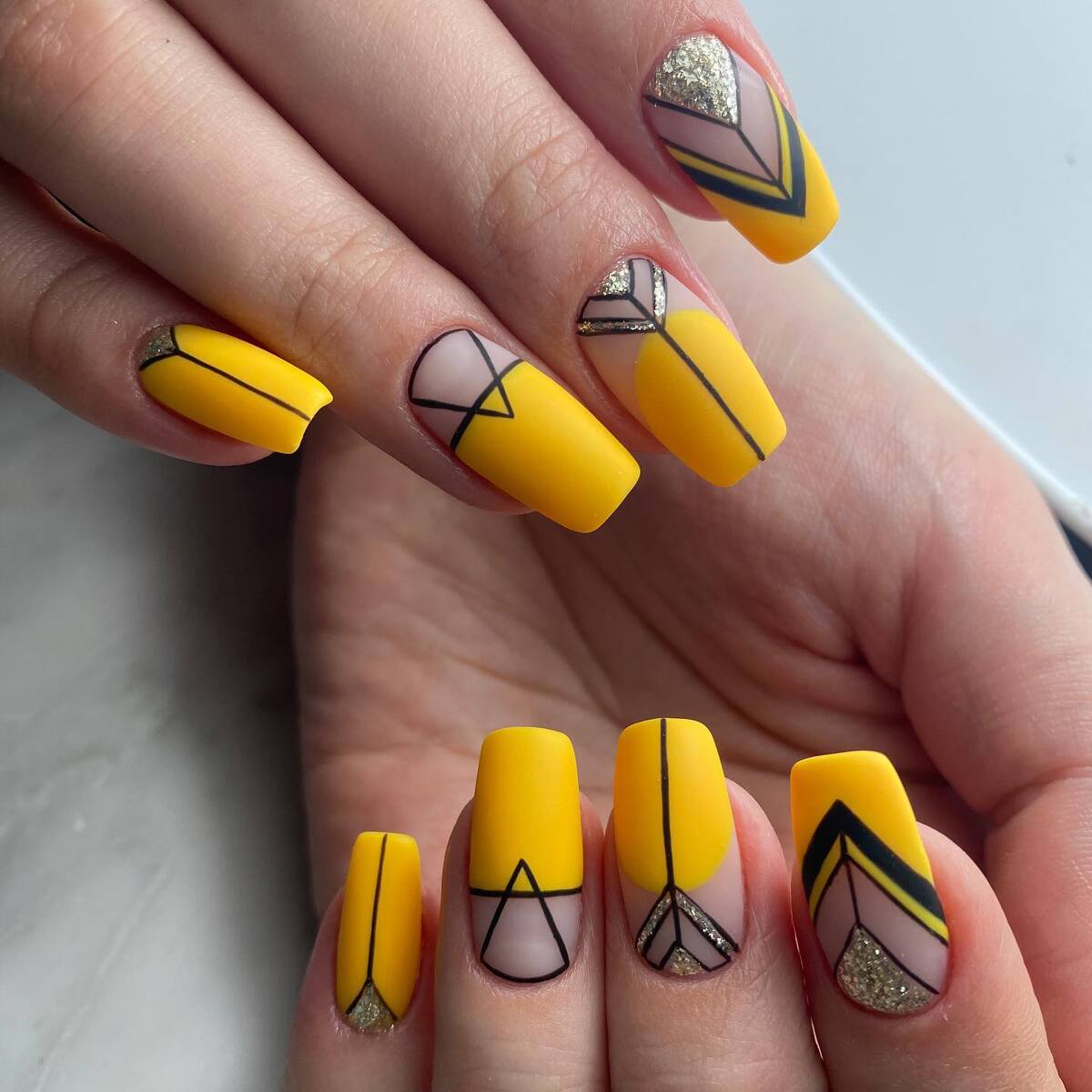 18. Chic Matte Yellow with Geometric and Glitter Accents
