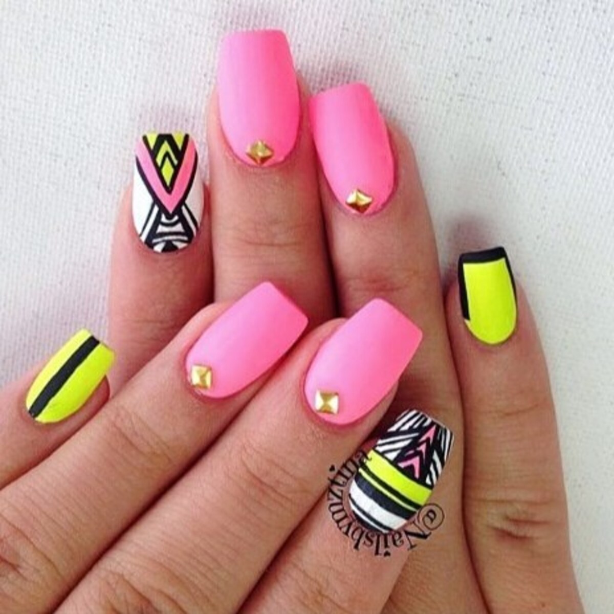 24. Playful Neon Pink and Yellow with Tribal Accents