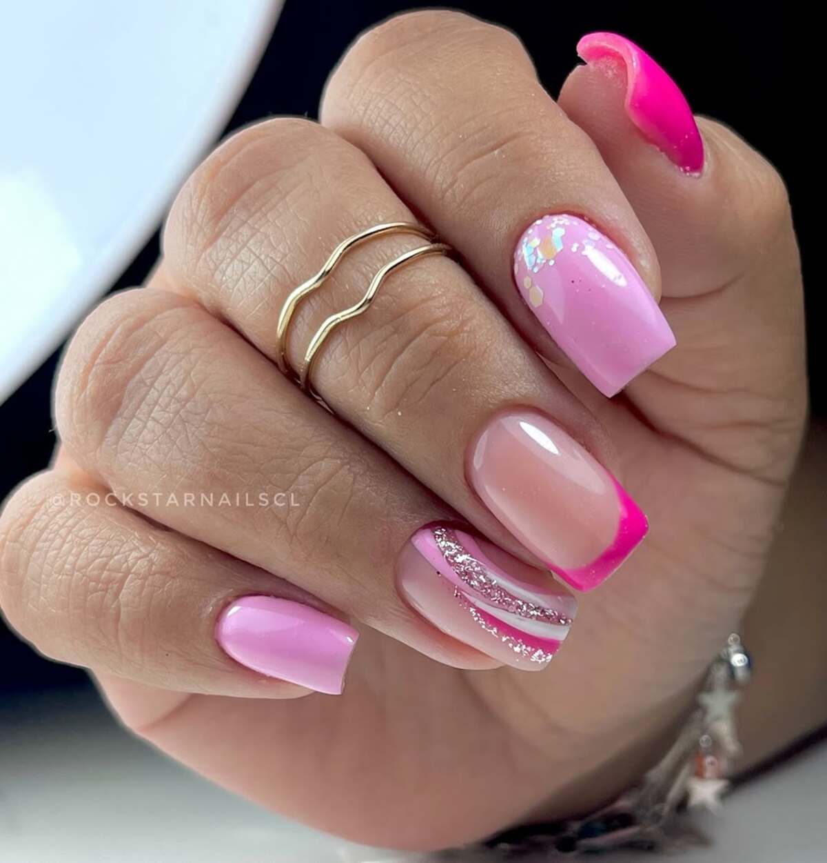 10. Short Square Pink Nails with Sparkly Swirls
