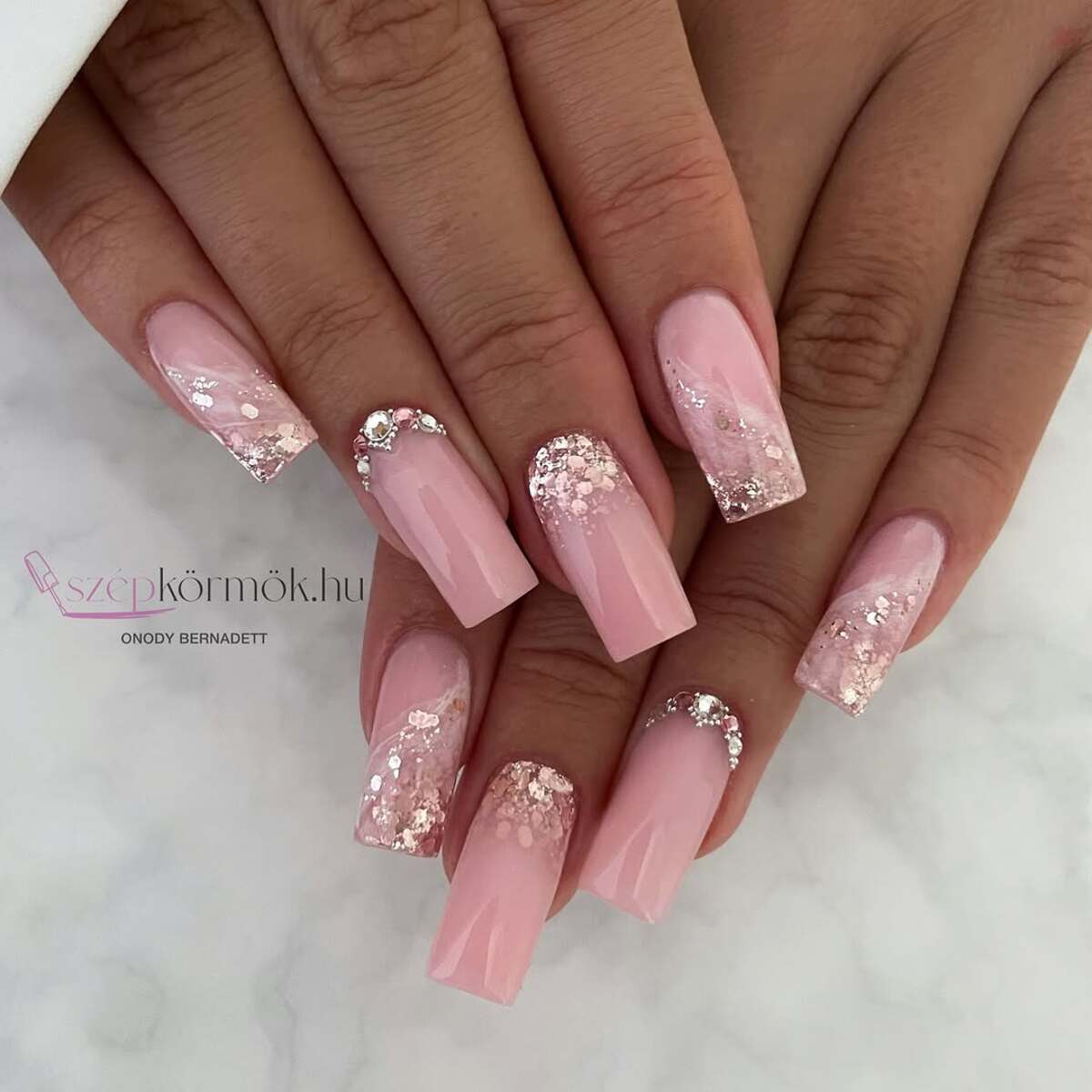 12. Nude Pink Nails with Glitter and Rhinestones