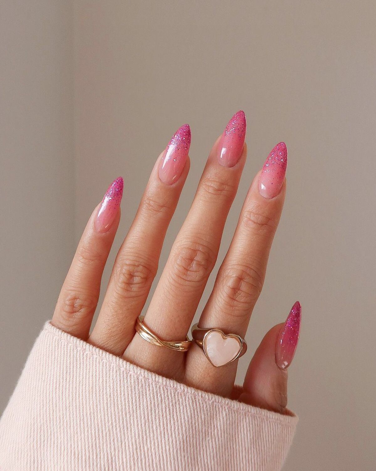 14. Pink Glitter Ombré Nails for a Glamorous Glow