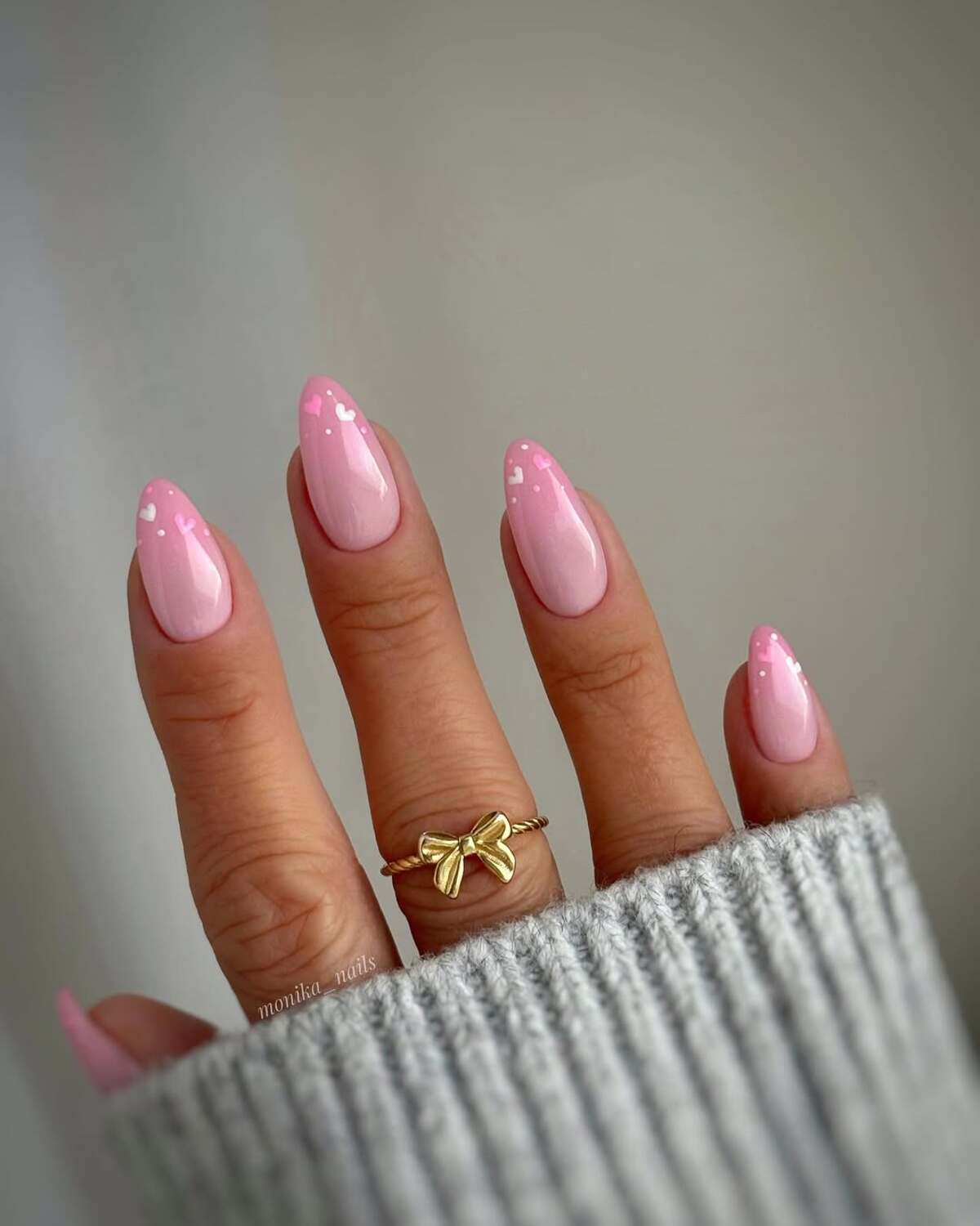 15. Minimalist Pink Nails with Tiny Heart Accents