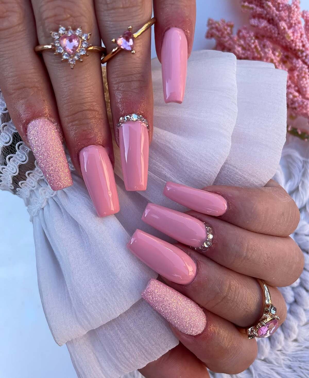 2. Glossy Pink Nails with Sparkle Accents