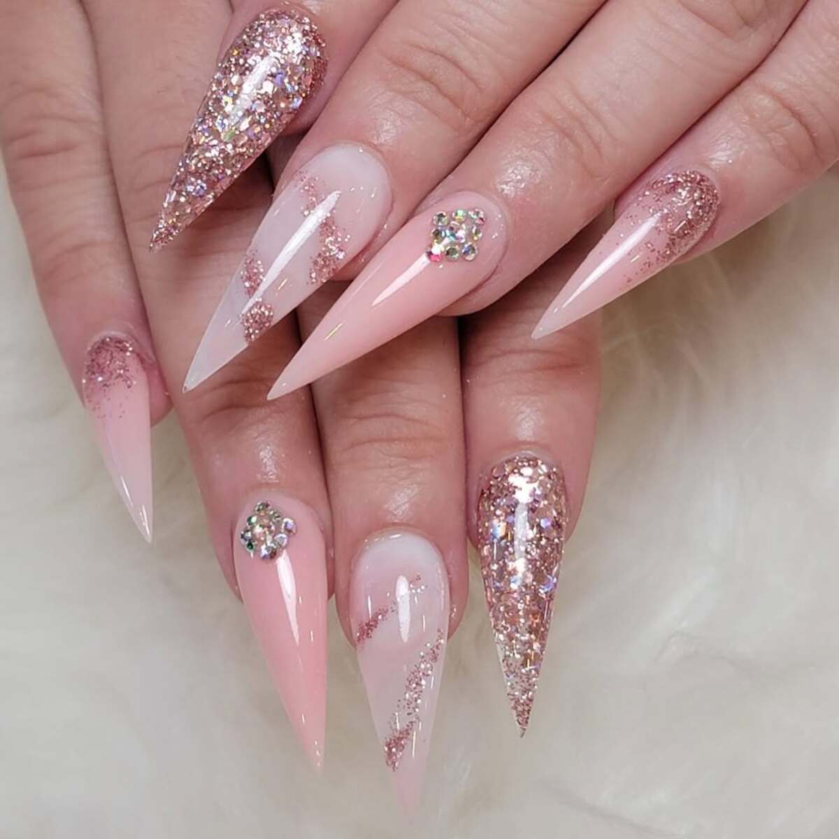 25. Sparkling Nude Pink Stiletto Nails