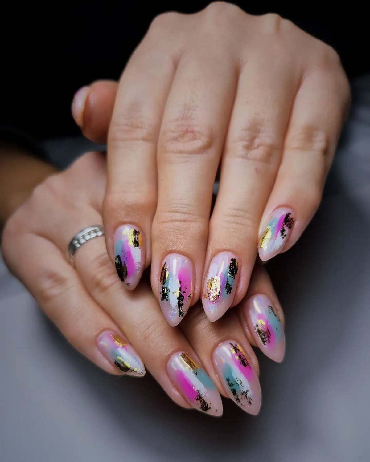 2. Abstract Stiletto Nails with Hot Pink and Aqua Accents