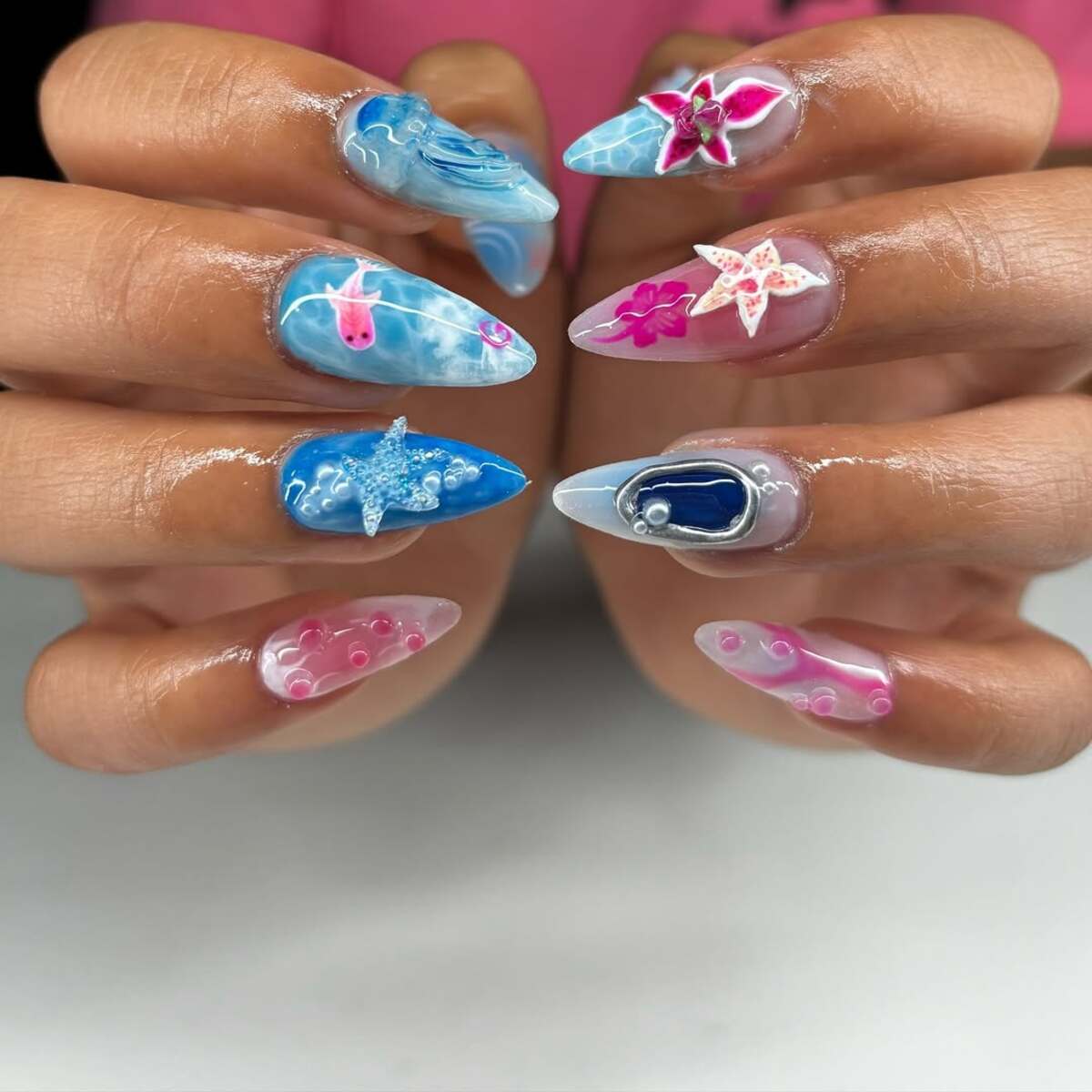 21. Ocean-Inspired Stiletto Nails with 3D Marine Details