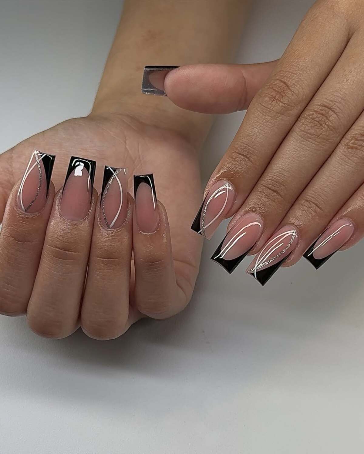 10. Transparent Tips with Black French Detailing