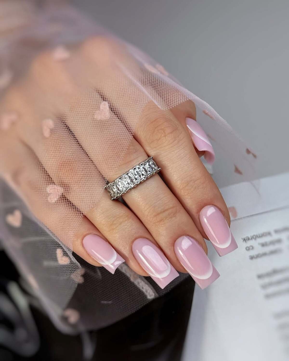 15. Soft Pink French with a Classic Touch