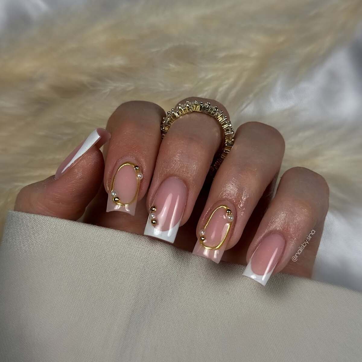 16. French Elegance with Golden Accents