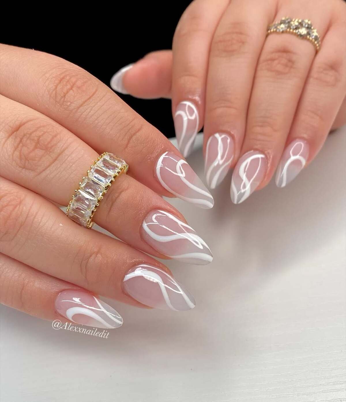 5. Chic White Swirls on Nude Base