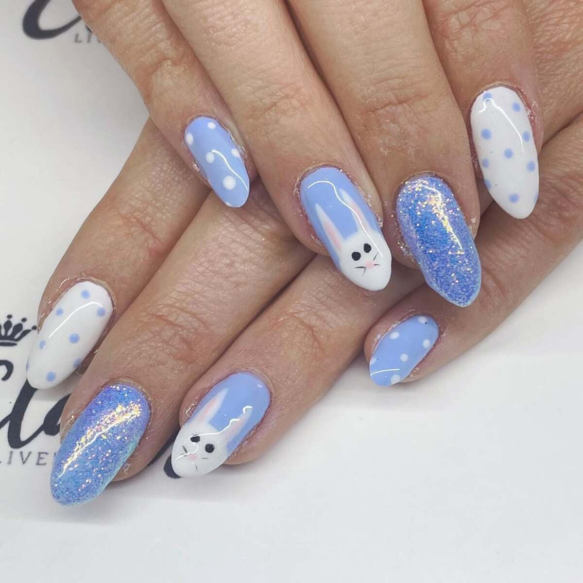 16. Frosty Blue Bunny and Glitter Nails