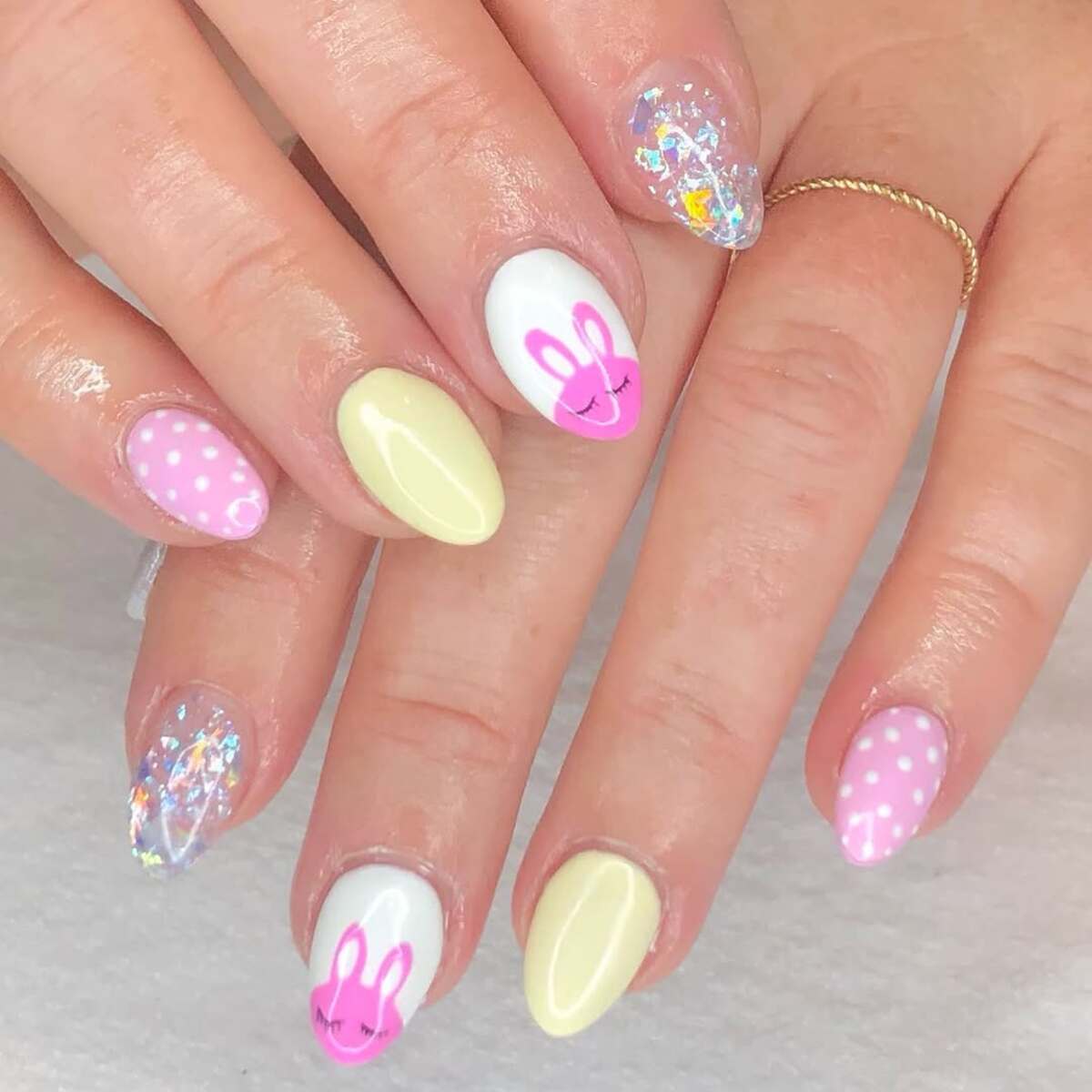 17. Playful Pastel Bunny and Sparkle Nails